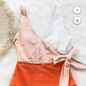 Multicolored 1 piece swimsuit.